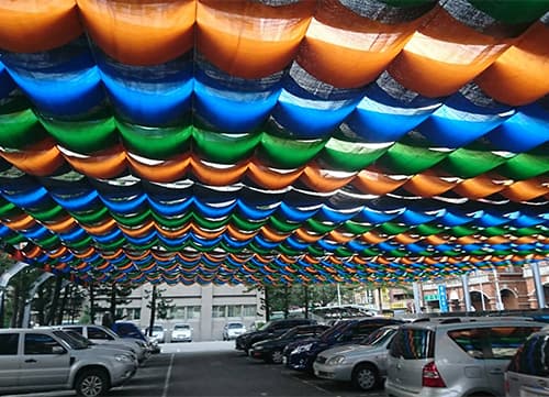 三冠牌RF圓扁針織停車場遮陽網應用實例｜HunkunNET 煥坤